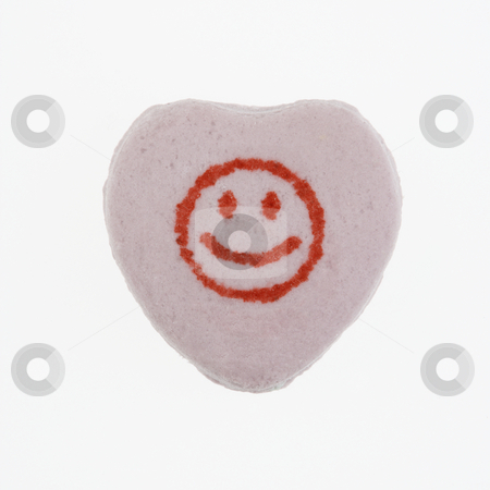 To use this stock image in your creative project, please select the size you need over to the right and click the "Add to Cart" button.
Your downloaded image will come with the Cutcaster watermark removed so don’t worry about the watermark you see on this page. Candy heart on white. stock photo, Purple candy heart with smiley face against white background. by Iofoto Images