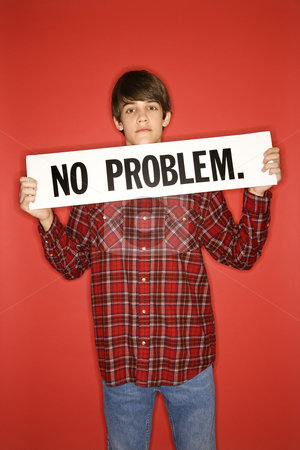 To use this stock image in your creative project, please select the size you need over to the right and click the "Add to Cart" button.
Your downloaded image will come with the Cutcaster watermark removed so don’t worry about the watermark you see on this page. Boy holding sign. stock photo, Portrait of Caucasian teen boy holding no problem sign under his chin. by Iofoto Images