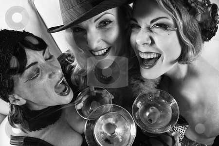 To use this stock image in your creative project, please select the size you need over to the right and click the "Add to Cart" button.
Your downloaded image will come with the Cutcaster watermark removed so don’t worry about the watermark you see on this page. Three retro women drinking. stock photo, Three retro prime adult Caucasian females out on the town. by Iofoto Images