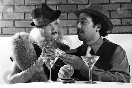 To use this stock image in your creative project, please select the size you need over to the right and click the "Add to Cart" button.
Your downloaded image will come with the Cutcaster watermark removed so don’t worry about the watermark you see on this page. Retro man paying woman. stock photo, Caucasian prime adult retro male giving money to Caucasian prime adult retro female. by Iofoto Images