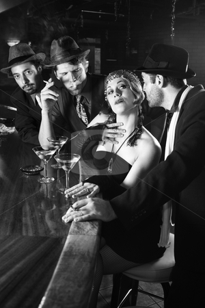 To use this stock image in your creative project, please select the size you need over to the right and click the "Add to Cart" button.
Your downloaded image will come with the Cutcaster watermark removed so don’t worry about the watermark you see on this page. Center of attention. stock photo, Caucasian prime adult retro female sitting at bar surrounded by suitors. by Iofoto Images