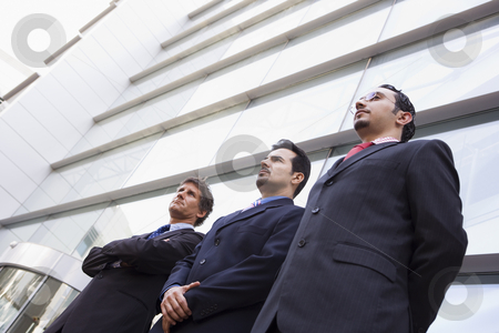 Group of businessmen outside office Group of businessmen outside office stock photo, Group of businessmen outside modern office building by Monkey Business Images