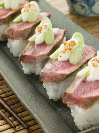 Beef Nigri with Horseradish and Wasabi Cream Beef Nigri with Horseradish and Wasabi Cream stock photo, Plate of Beef Nigri with Horseradish and Wasabi Cream by Monkey Business Images
