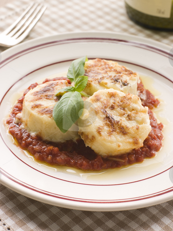 To use this stock image in your creative project, please select the size you need over to the right and click the "Add to Cart" button.
Your downloaded image will come with the Cutcaster watermark removed so don’t worry about the watermark you see on this page. Gnocchi Romana with Tomato Sauce stock photo, Plate of Gnocchi Romana with Tomato Sauce by Monkey Business Images