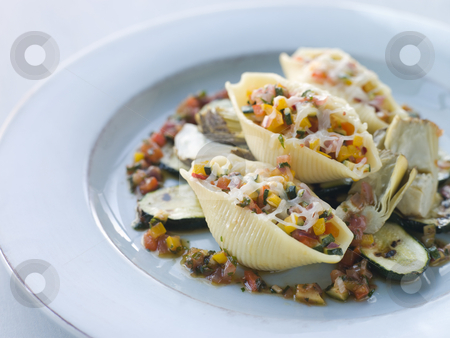To use this stock image in your creative project, please select the size you need over to the right and click the "Add to Cart" button.
Your downloaded image will come with the Cutcaster watermark removed so don’t worry about the watermark you see on this page. Conchiglioni Pasta filled with Mediterranean Vegetables and Baby stock photo, by Monkey Business Images