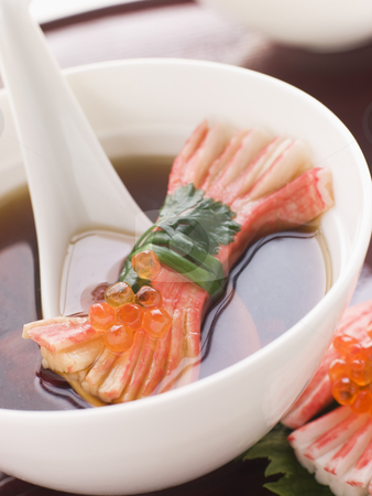 To use this stock image in your creative project, please select the size you need over to the right and click the "Add to Cart" button.
Your downloaded image will come with the Cutcaster watermark removed so don’t worry about the watermark you see on this page. Clear Soup with Snow Crab Sticks stock photo, Bowl of Clear Soup with Snow Crab Sticks and Fish Roe decoration by Monkey Business Images