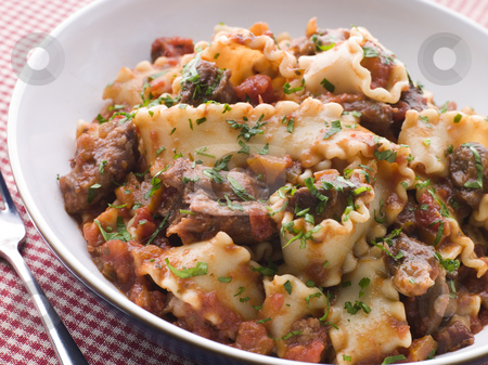 To use this stock image in your creative project, please select the size you need over to the right and click the "Add to Cart" button.
Your downloaded image will come with the Cutcaster watermark removed so don’t worry about the watermark you see on this page. Strips of Fillet Steak in a Chilli Tomato Sauce with Trompetti P stock photo, by Monkey Business Images