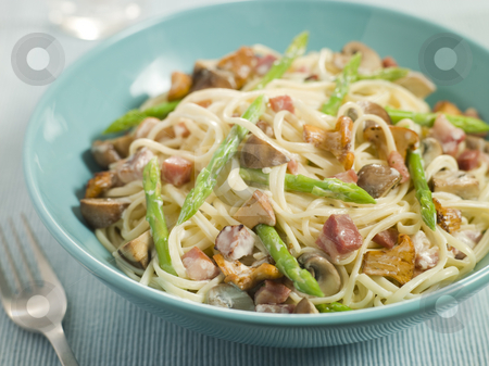 Linguine with Girolle Mushrooms Asparagus and Pancetta Linguine with Girolle Mushrooms Asparagus and Pancetta stock photo, by Monkey Business Images
