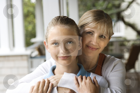 Mom Hugging Daughter