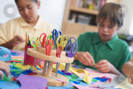 To use this stock image in your creative project, please select the size you need over to the right and click the "Add to Cart" button.
Your downloaded image will come with the Cutcaster watermark removed so don’t worry about the watermark you see on this page. Elementary school art class stock photo, Elementary school art class with pupils by Monkey Business Images