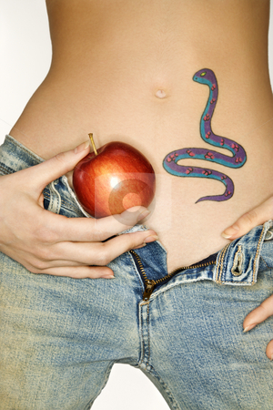 To use this stock image in your creative project, please select the size you need over to the right and click the "Add to Cart" button.
Your downloaded image will come with the Cutcaster watermark removed so don’t worry about the watermark you see on this page. Snake tattoo and apple. stock photo, Portrait of attractive Caucasian young woman holding apple by snake tattoo on stomach. by Iofoto Images