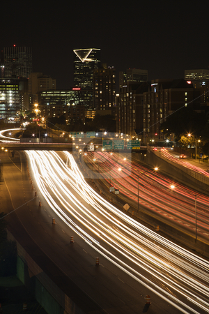 To use this stock image in your creative project, please select the size you need over to the right and click the "Add to Cart" button.
Your downloaded image will come with the Cutcaster watermark removed so don’t worry about the watermark you see on this page. City at night. stock photo, Nightscape of Atlanta, Georgia skyline with blurred automobile lights on highway in foreground. by Iofoto Images