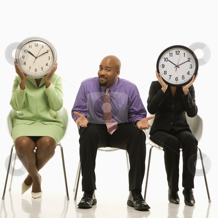 To use this stock image in your creative project, please select the size you need over to the right and click the "Add to Cart" button.
Your downloaded image will come with the Cutcaster watermark removed so don’t worry about the watermark you see on this page. Work time concept. stock photo, Businesswomen sitting holding clocks over faces while African-American businessman shrugs. by Iofoto Images