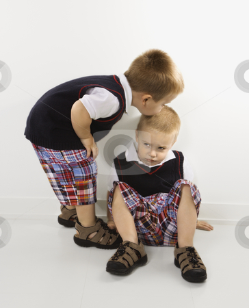 To use this stock image in your creative project, please select the size you need over to the right and click the "Add to Cart" button.
Your downloaded image will come with the Cutcaster watermark removed so don’t worry about the watermark you see on this page. Boy kissing brother on head. stock photo, Caucasian twin boy kissing other twin boy on head. by Iofoto Images