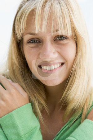To use this stock image in your creative project, please select the size you need over to the right and click the "Add to Cart" button.
Your downloaded image will come with the Cutcaster watermark removed so don’t worry about the watermark you see on this page. Close-up of young woman stock photo, Close-up of young woman smiling to camera by Monkey Business Images
