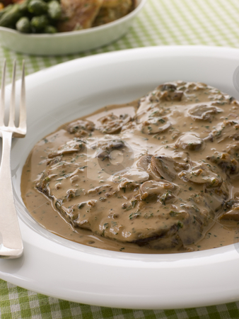 To use this stock image in your creative project, please select the size you need over to the right and click the "Add to Cart" button.
Your downloaded image will come with the Cutcaster watermark removed so don’t worry about the watermark you see on this page. Steak Diane stock photo, by Monkey Business Images
