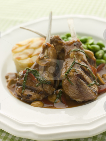 Grilled Lamb Cutlets Chasseur sauce Pomme Anna and Baby Broad be Grilled Lamb Cutlets Chasseur sauce Pomme Anna and Baby Broad be stock photo, by Monkey Business Images