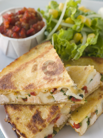 Quesadillas with Cajun Chicken Cheese Tomato Salsa and corn Sala Quesadillas with Cajun Chicken Cheese Tomato Salsa and corn Sala stock photo, by Monkey Business Images