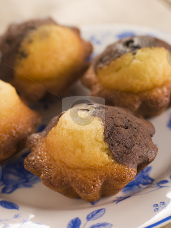 Chocolate and Vanilla Cake cooked in Brioche Tins Chocolate and Vanilla Cake cooked in Brioche Tins stock photo, by Monkey Business Images