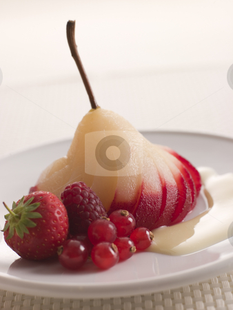 To use this stock image in your creative project, please select the size you need over to the right and click the "Add to Cart" button.
Your downloaded image will come with the Cutcaster watermark removed so don’t worry about the watermark you see on this page. Poached Pear Marinated in Grenadine stock photo, by Monkey Business Images