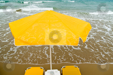To use this stock image in your creative project, please select the size you need over to the right and click the "Add to Cart" button.
Your downloaded image will come with the Cutcaster watermark removed so don’t worry about the watermark you see on this page. Umbrella and chairs stock photo, Chairs and umbrella on beach by Dariusz Majgier