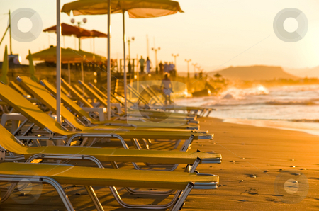 To use this stock image in your creative project, please select the size you need over to the right and click the "Add to Cart" button.
Your downloaded image will come with the Cutcaster watermark removed so don’t worry about the watermark you see on this page. Umbrella and chairs stock photo, Chairs and umbrella on beach by Dariusz Majgier