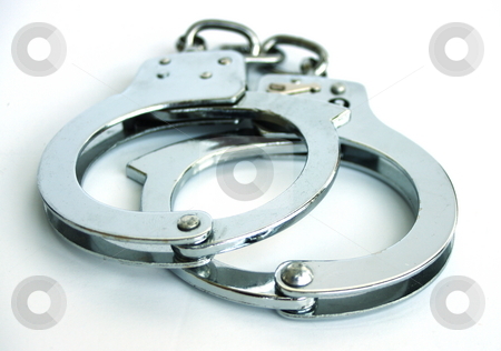 To use this stock image in your creative project, please select the size you need over to the right and click the "Add to Cart" button.
Your downloaded image will come with the Cutcaster watermark removed so don’t worry about the watermark you see on this page. Handcuffs stock photo, Empty metal handcuffs. Isolated on a white background by Martin Darley