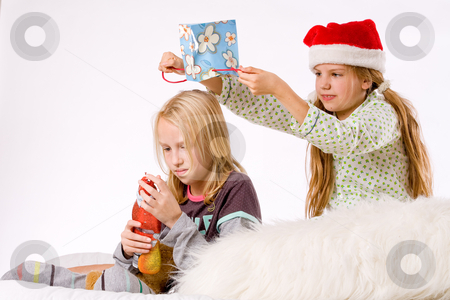 Christmas fight revenge Christmas fight revenge stock photo, Two children having a fight about the present by Frenk and Danielle Kaufmann
