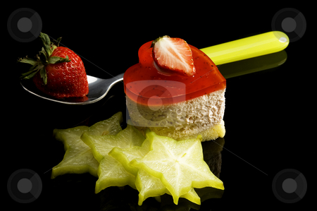 To use this stock image in your creative project, please select the size you need over to the right and click the "Add to Cart" button.
Your downloaded image will come with the Cutcaster watermark removed so don’t worry about the watermark you see on this page. Heart cake stock photo, Heart shaped strawberry cake with carambola or star fruit decoration over black background by Francesco Perre