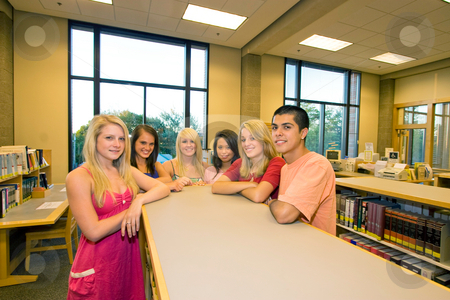 To use this stock image in your creative project, please select the size you need over to the right and click the "Add to Cart" button.
Your downloaded image will come with the Cutcaster watermark removed so don’t worry about the watermark you see on this page. Students in Class - Horizontal stock photo, Five girl students and one boy smiling and folding their arms in class at school. Horizontally framed photo. by Orange Line Media