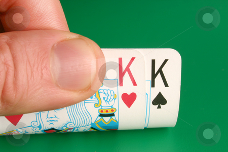 Looking at pocket Kings Cowboys during a poker game Looking at pocket Kings Cowboys during a poker game stock photo, Looking at pocket Kings (Cowboys) during a poker game by Stephen Rees