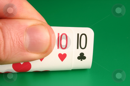 To use this stock image in your creative project, please select the size you need over to the right and click the "Add to Cart" button.
Your downloaded image will come with the Cutcaster watermark removed so don’t worry about the watermark you see on this page. Looking at pocket tens during a poker game stock photo, Looking at pocket tens during a poker game by Stephen Rees