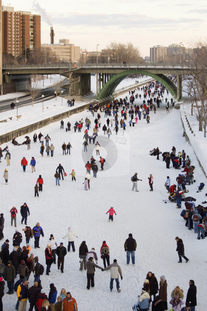 To use this stock image in your creative project, please select the size you need over to the right and click the "Add to Cart" button.
Your downloaded image will come with the Cutcaster watermark removed so don’t worry about the watermark you see on this page. Rideau Canal stock photo, Skaters in ice of Rideau Canal, Ottawa. by Pavel Cheiko