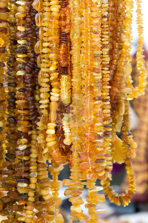 To use this stock image in your creative project, please select the size you need over to the right and click the "Add to Cart" button.
Your downloaded image will come with the Cutcaster watermark removed so don’t worry about the watermark you see on this page. Amber beads stock photo, Amber beads by Andrey Butenko