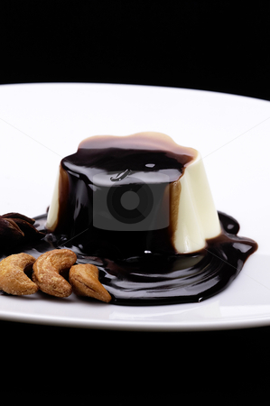 To use this stock image in your creative project, please select the size you need over to the right and click the "Add to Cart" button.
Your downloaded image will come with the Cutcaster watermark removed so don’t worry about the watermark you see on this page. Vanilla pudding and chocolate stock photo, Vanilla pudding and chocolate on top by Francesco Perre