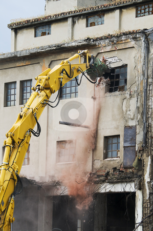 To use this stock image in your creative project, please select the size you need over to the right and click the "Add to Cart" button.
Your downloaded image will come with the Cutcaster watermark removed so don’t worry about the watermark you see on this page. Demolition stock photo, Machinery working to demolish old building by Massimiliano Leban