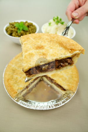 Slice Of Beef Pie Slice Of Beef Pie stock photo, Slice of beef pie with peas and mashed potato ready to serve. by Brett Mulcahy