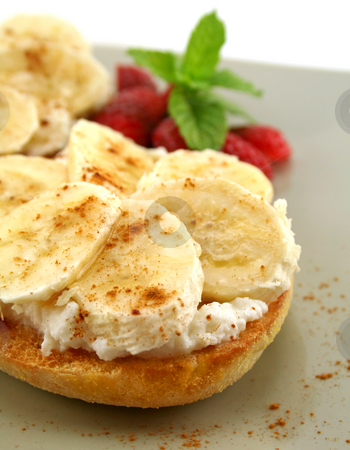 Banana And Ricotta Muffins Banana And Ricotta Muffins stock photo, Banana and riccotta muffins with strawberries and mint ready to serve. by Brett Mulcahy