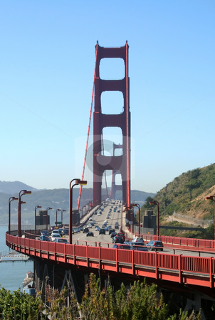 To use this stock image in your creative project, please select the size you need over to the right and click the "Add to Cart" button.
Your downloaded image will come with the Cutcaster watermark removed so don’t worry about the watermark you see on this page. Golden Gate Bridge San Francisco stock photo, Traffic streams across the Golden Gate Bridge in San Francisco. by Brett Mulcahy