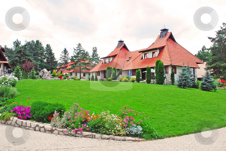 To use this stock image in your creative project, please select the size you need over to the right and click the "Add to Cart" button.
Your downloaded image will come with the Cutcaster watermark removed so don’t worry about the watermark you see on this page. Cottage village - lawn stock photo, Weekend houses with gardens and stone road in Serbia, Zlatibor by Julija Sapic