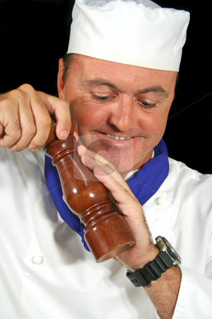 To use this stock image in your creative project, please select the size you need over to the right and click the "Add to Cart" button.
Your downloaded image will come with the Cutcaster watermark removed so don’t worry about the watermark you see on this page. Pepper Chef stock photo, Chef grinds the pepper mill for a customer. by Brett Mulcahy