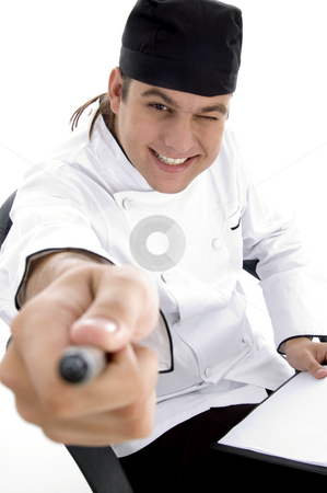 To use this stock image in your creative project, please select the size you need over to the right and click the "Add to Cart" button.
Your downloaded image will come with the Cutcaster watermark removed so don’t worry about the watermark you see on this page. Happy male chef posing in front of camera stock photo, Happy male chef posing in front of camera with white background by Imagery Majestic