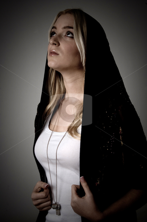 To use this stock image in your creative project, please select the size you need over to the right and click the "Add to Cart" button.
Your downloaded image will come with the Cutcaster watermark removed so don’t worry about the watermark you see on this page. Side view of young female with stole looking up stock photo, Side view of young female with stole looking up on an isolated white background by Imagery Majestic