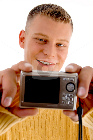 To use this stock image in your creative project, please select the size you need over to the right and click the "Add to Cart" button.
Your downloaded image will come with the Cutcaster watermark removed so don’t worry about the watermark you see on this page. Man looking into camera stock photo, Man looking into camera on an isolated background by Imagery Majestic
