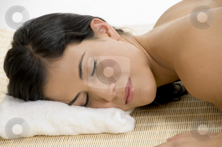 To use this stock image in your creative project, please select the size you need over to the right and click the "Add to Cart" button.
Your downloaded image will come with the Cutcaster watermark removed so don’t worry about the watermark you see on this page. Young woman sleeping on mat stock photo, Young woman sleeping on bamboo mat on an isolated white background by Imagery Majestic