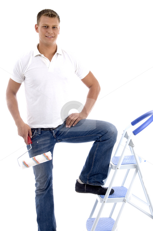 Handsome painter standing on ladder chair Handsome painter standing on ladder chair stock photo, Handsome painter standing on ladder chair isolated on white background by Imagery Majestic