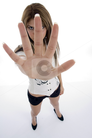 Standing female showing her fingers Standing female showing her fingers stock photo, Standing female showing her fingers on an isolated background by Imagery Majestic