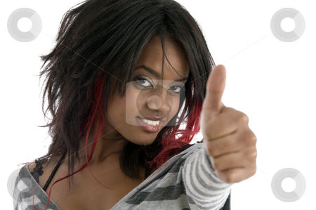 To use this stock image in your creative project, please select the size you need over to the right and click the "Add to Cart" button.
Your downloaded image will come with the Cutcaster watermark removed so don’t worry about the watermark you see on this page. Young girl wishing good luck stock photo, Young girl wishing good luck against white background by Imagery Majestic