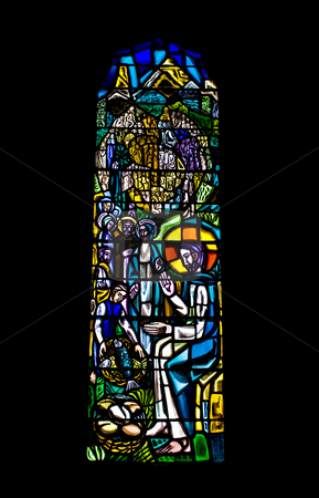 Religious Stained Glass Window Religious Stained Glass Window stock photo, A religious stained glass window inside a church by Stephen Bonk