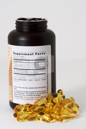 To use this stock image in your creative project, please select the size you need over to the right and click the "Add to Cart" button.
Your downloaded image will come with the Cutcaster watermark removed so don’t worry about the watermark you see on this page. Fish Oil and Bottle stock photo, Fish oil capsules and bottle on a white background by Stephen Bonk